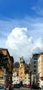 Big cumulonimbus cloud over city tower with cloc in Rijeka city