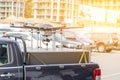 Big custom made drone over picup truck trunk. Heavy UAV hexacopternwith construction site on the background. Commercia