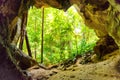 Big dark cave and sun light Royalty Free Stock Photo