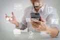 Big data analytics with business intelligence (BI) concept. businessman using mobile phone and laptop computer on white desk Royalty Free Stock Photo