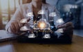 Big data analytics and business intelligence concept with chart and graph icons on a digital screen interface and a businessman in