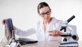 Big data in medicine and pharmacology, concept. A young woman, a laboratory assistant or a researcher