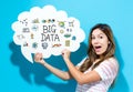 Big Data text with young woman holding a speech bubble Royalty Free Stock Photo