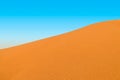 Big Desert Sand Dune with Blue Sky Background Royalty Free Stock Photo