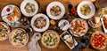 Big dinner table with italian food, pizzas and pastas Royalty Free Stock Photo