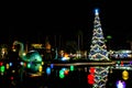 Big dinosaur, Christmas tree and holidays decorations in Echo Lake at Hollywood Studios 5