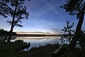 Big Dipper stars observing over forest lake