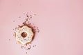 Big donut and Gingerbread donut on pink background birthday decoration