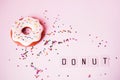 Big donut and Gingerbread donut on pink background birthday decoration