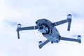 Big drone in midair against blurry cloudy sky Royalty Free Stock Photo