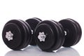 Big dumbells over white background Royalty Free Stock Photo