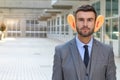 Big-eared businessman in office space