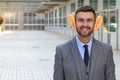 Big-eared businessman smiling in office space Royalty Free Stock Photo
