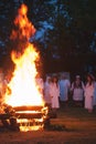 Big Easter bonfire, People look at the fire,