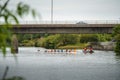 Big eight rowing team training. Coach giving instructions. Water sport and outdoor activity