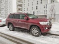Big elegant Toyota Landcruiser 8V parked in snow Royalty Free Stock Photo