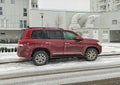 Big elegant Toyota Landcruiser 8V parked in snow Royalty Free Stock Photo