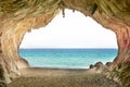 Big empty cave with entrance to sea Royalty Free Stock Photo
