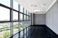 Big empty office space with window wall. Day light illumination. Royalty Free Stock Photo