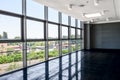 Big empty office space with window wall. Day light illumination.