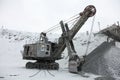 Big Excavator to load crushed iron ore, crushed stone, rocks. Royalty Free Stock Photo