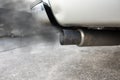 Big Exhaust from black car, air pollution concept Royalty Free Stock Photo