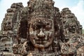 Big face and two small faces in Angkor Wat Royalty Free Stock Photo