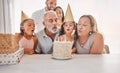 Big family celebration party, birthday cake and children blow candle fire to celebrate annual event with present and