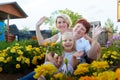 Big family with child playing in a park. Women and girl relax in the garden. Mother, grandmother and grandchildren Royalty Free Stock Photo