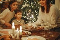 Big family with children celebrate New Year at cozy warm homely atmosphere Royalty Free Stock Photo