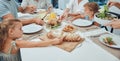 Big family, food and lunch at table in home, eating and bonding. Fine dining, bread and father, mother and grandparents