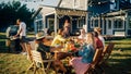 Big Family and Friends Celebrating Outside in a Backyard at Home. Diverse Group of Children, Adults Royalty Free Stock Photo