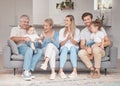 Big family, grandparents and children on sofa in living room for holiday, baby language communication learning and love Royalty Free Stock Photo