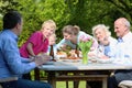 Big family having lunch in the garden Royalty Free Stock Photo