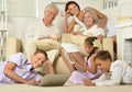 Big family posing in home interior