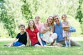 Big family in summer park outdoors. Royalty Free Stock Photo