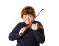 Big fat red-haired boy with small violin Royalty Free Stock Photo