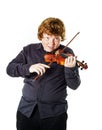 Big fat red-haired boy with small violin Royalty Free Stock Photo