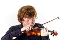 Big fat red-haired boy with small violin Royalty Free Stock Photo