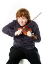 Big fat red-haired boy with small violin Royalty Free Stock Photo