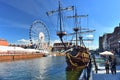 Big ferries wheel and a galeon replica in Gdansk Royalty Free Stock Photo