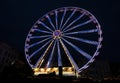 Big ferris wheel in blurred motion at night, copy space Royalty Free Stock Photo