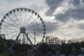 Big Ferris Wheel on clear blue sky background, close up