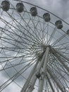 A big Ferris wheel in a grey sky