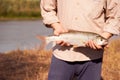 Big fish asp in men`s hands. The fisherman caught the fish. Ural River Royalty Free Stock Photo