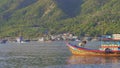 Big fisherman boats coming out of the port in Asia. Overfishing concept