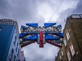 Big flashing sign signifying the entrance to street of Carnaby