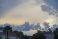 Big, fluffy, billowy cumulus sunset clouds gather in the sky