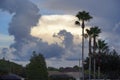 Big, fluffy, billowy cumulus sunset clouds gather in the sky