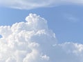 Beautiful big fluffy clouds with sunlight in blue sky Royalty Free Stock Photo